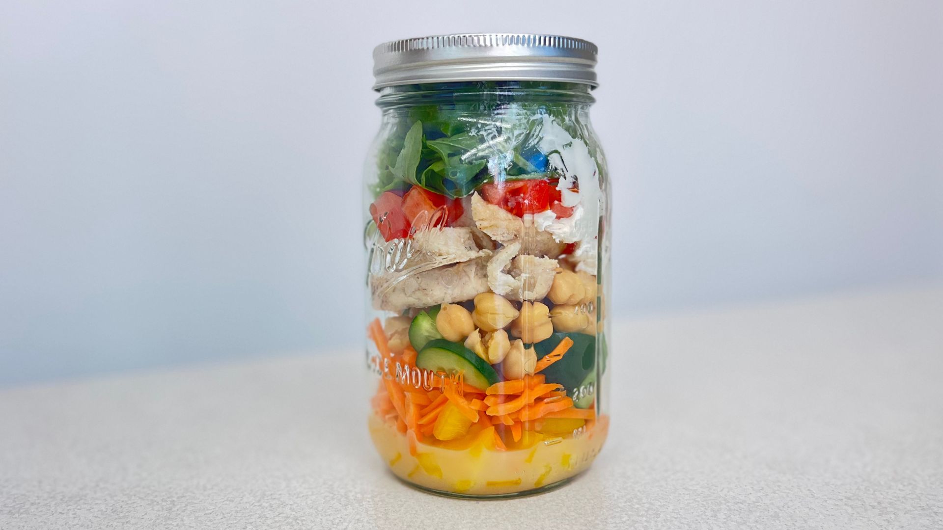 Salad inside a glass jar
