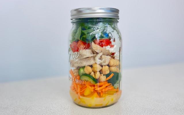 Salad inside a glass jar